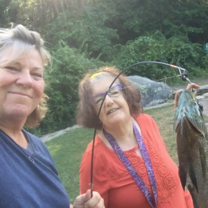 Adult resident and staff fishing