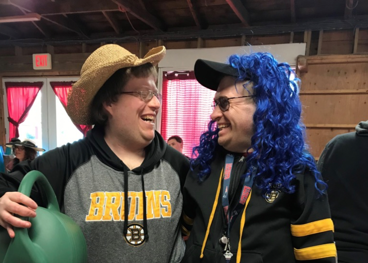 Two Adult Residents Having Fun at a Halloween Event