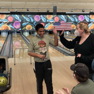 Student bowling at Special Olympics