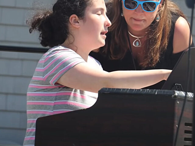 Student plays piano in Campus Talent Show